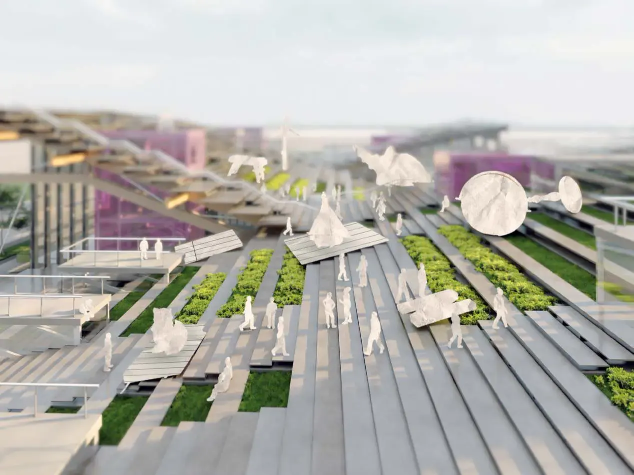 People walking and sitting on a stepped roof planted with strips of grass